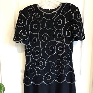 Black evening dress, sequined and beaded with crinkled chiffon skirt. Size 6
